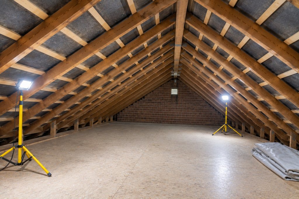 A cleared roof space with the timbers back in view.